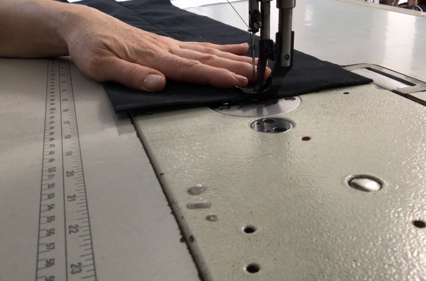 Sewing a velvet piece on an industrial sewing machine